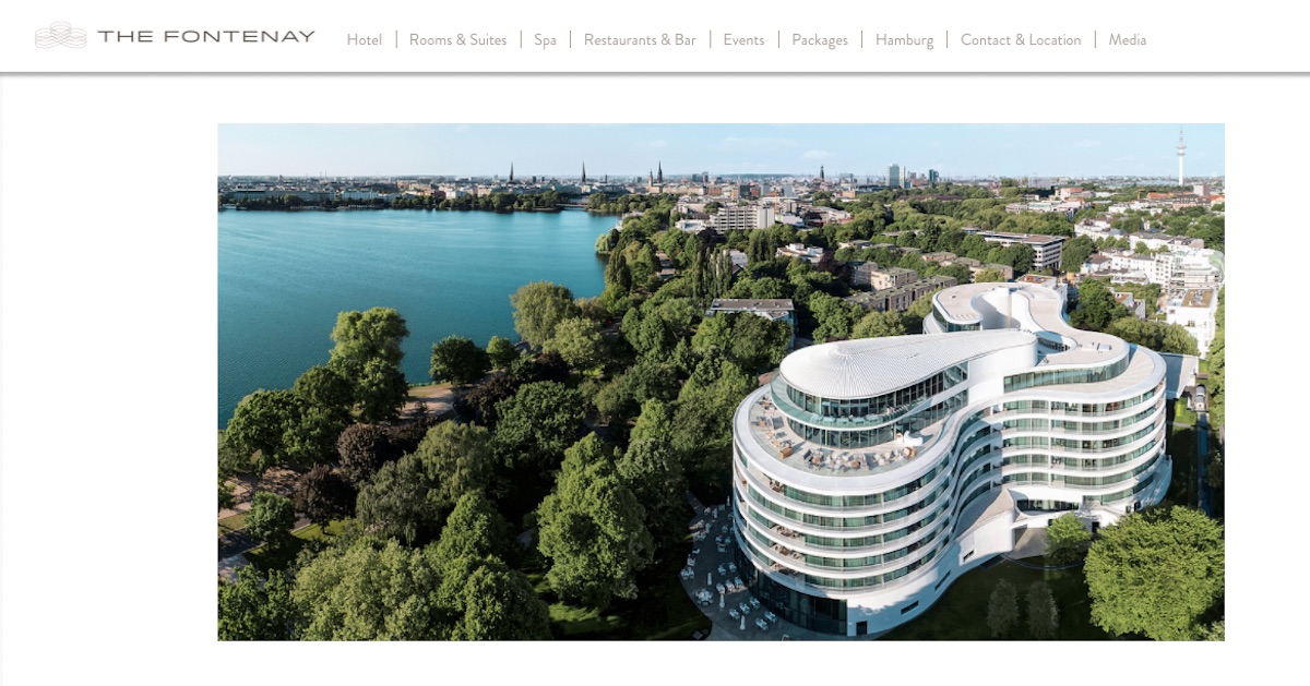Webpage with picture of birds eye view of The Fontenay hotel by Alster Lake in Hamburg.